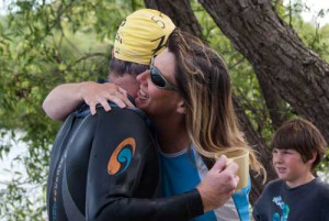 Ray Scott receives a hug from his swimming coach Jackie White.