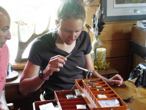 A young ‘scientist’ takes part in Manitoulin Streams’ “Stream  Detective” program to learn about stream life, rehabilitation  programs and spawning areas. 