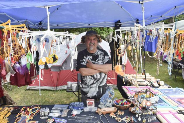 Vendor Roger Madahbee of Sagamok displays his wares.