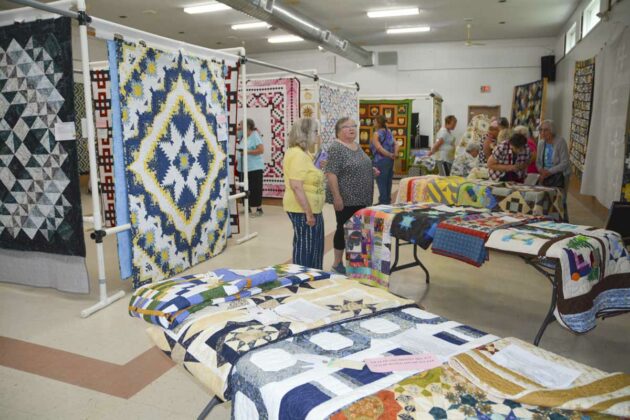 The Manitoulin Quilts Galore! quilt show was a popular stop on the Manitoulin Art Tour, held July 14-16 at locations across Manitoulin Island. The quilt show filled up two levels of the Assiginack Curling Club and drew crowds of people who came to see the talented works of Island fibre artists. photo by Alicia McCutcheon