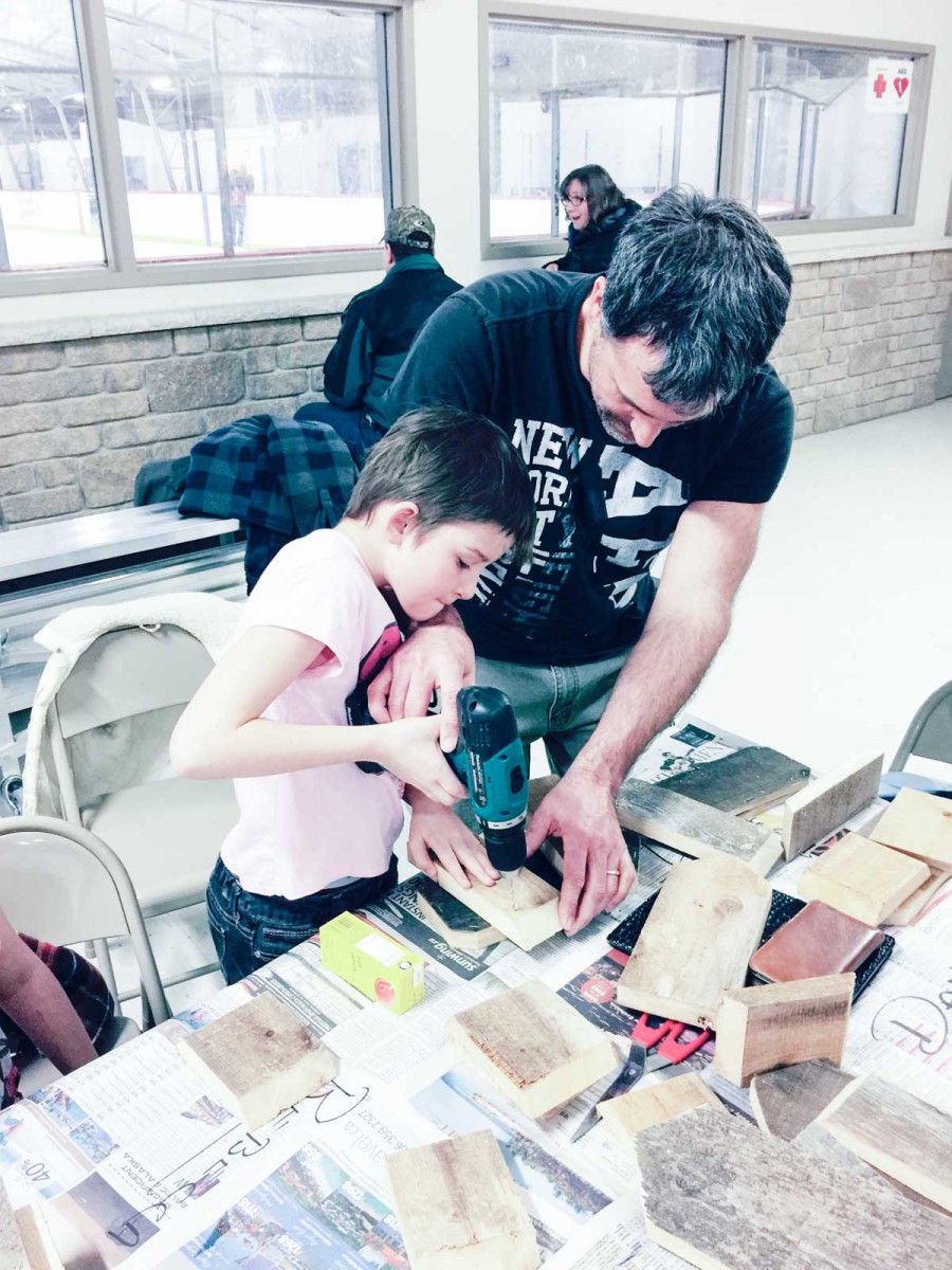 The Fields family helped kids make bat houses.