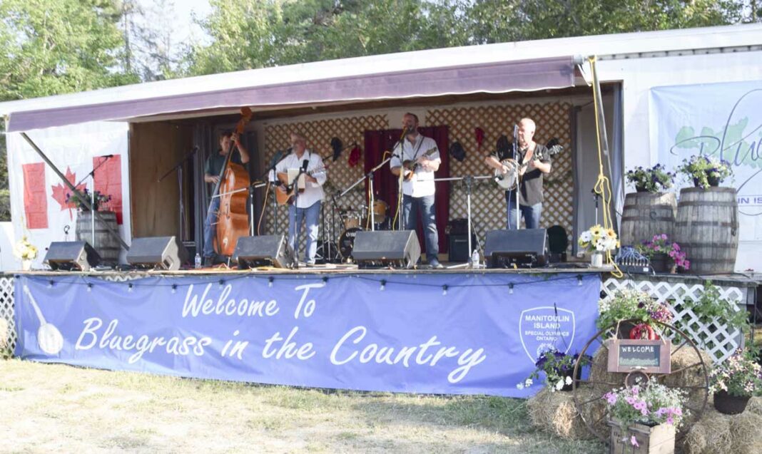 Larry Carriere and Different Picks hit the Bluegrass in the Country Stage.