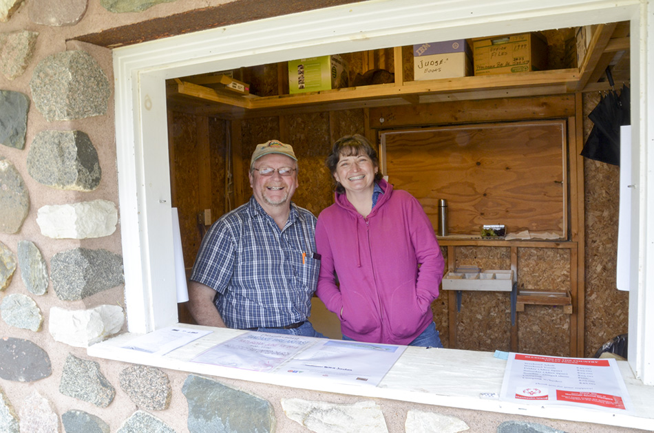 The Bells were the enthusiastic ticket sellers at Bluegrass in the  Country.