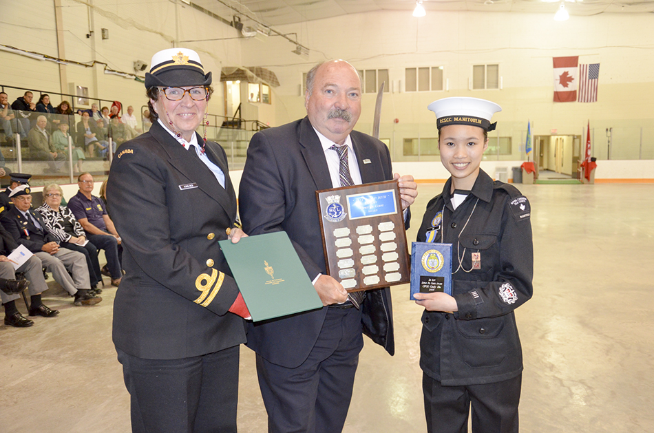 The Cadet Esprit de Corps Ed Kift Memorial Award was presented to  Chief Petty Officer Second Class Cindy Hu by Mayor Al MacNevin and  Commanding Officer, Lieutenant (Navy) Maggie King-Roi. 