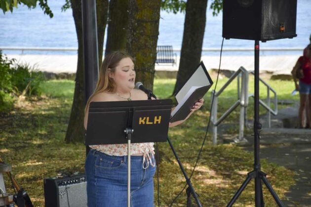 Katie Harper sings O Canada in English, French and Aninishinabemowin.