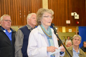 Ingrid Belenson of Spring Bay poses a question on genetically  modified foods to the candidates. photos by Michael Erskine