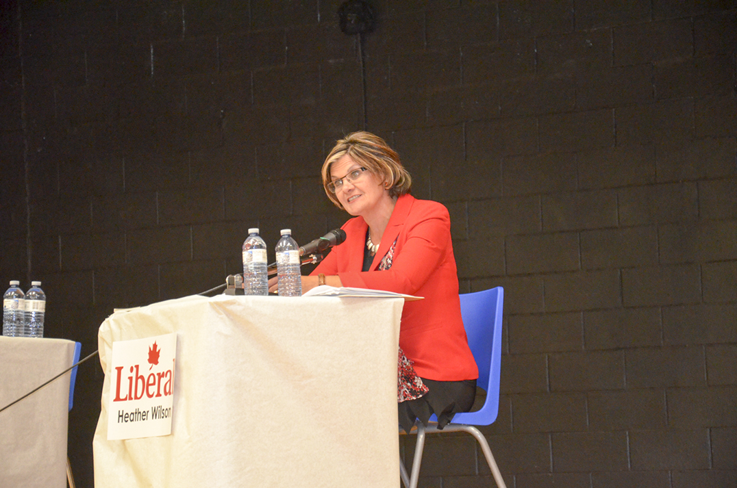 Heather Wilson, Liberal candidate, responds to a question from the floor.