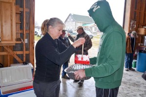 Manitoulin Streams coordinator Seija Deschenes loads Scotty box panels into blocks. photos by Michael Erskine