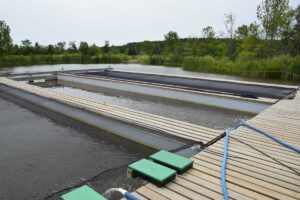 Recycled open water cages may not be solid enough for the big water but work fine in the sheltered ponds. photo by Michael Erskine