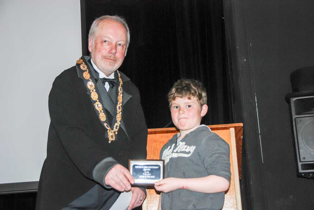 For his beautiful art work of a scene in Gore Bay, Mason McLaughlin in the Grade 2 class was  presented with the Artist of the Year Award by Mayor Ron Lane.  