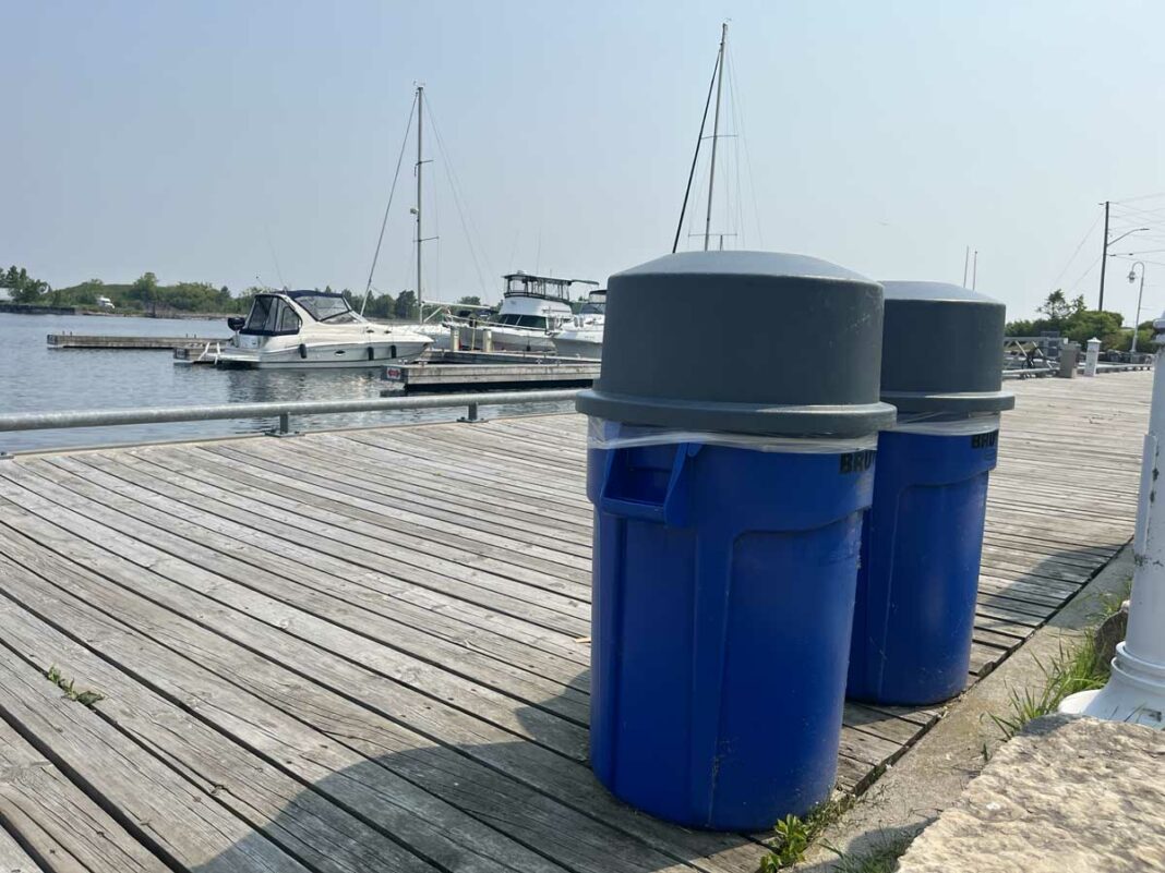 Garbage cans on the waterfront docks in Little Current will be doing heavier duty this summer as the large bins that have been placed near the waterfront will not be returning this year due to abuse. photo by Alicia McCutcheon