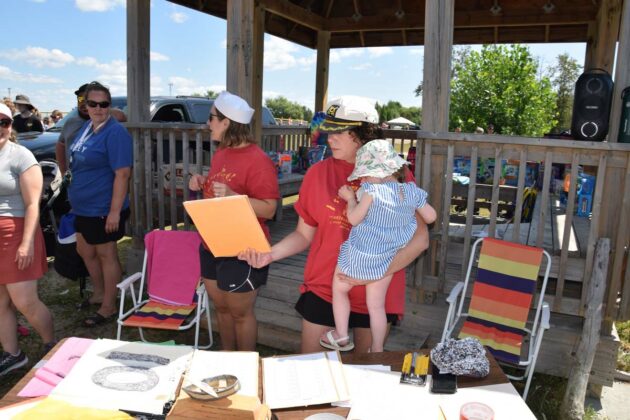 Volunteers hard at work at the cardboard boat races.