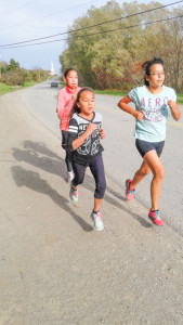 Victoria Trudeau, Autumn Peltier and Sierra Pangowish out for a training run.