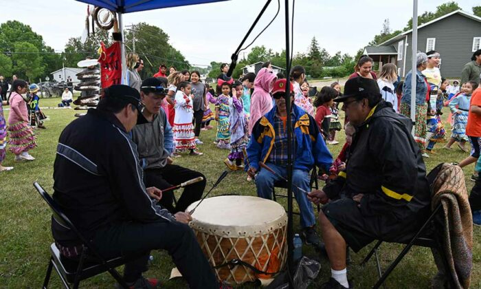 The heartbeat of the nation rings out across the grounds as grandfather drum’s voice calls the dancers onto the arena floor. photo by Dwayne Animikwan