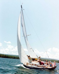 Dr. Jack Bailey and his family enjoy a great day of sailing under gentle blue skies aboard his beloved sail boat Swift Wing.