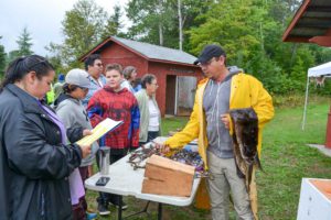 Trapper Norman Assiniwe talks to  students about the different types of traps.