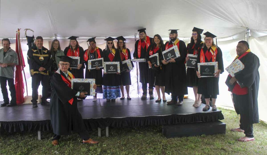 Twelve graduates this year graduated with Anishinaabe Aadziwin Distinction. Throughout the academic year, students in all programs track and document their voluntary participation individually or as a class in their chosen Aadziwin activities, with a goal of reaching a minimum of 24 hours by the end of the academic year. With the minimum hours achieved, graduating students are recognized on this day as an Anishinaabe Aadziwin Distinction Graduate. photo by Veronica Roy