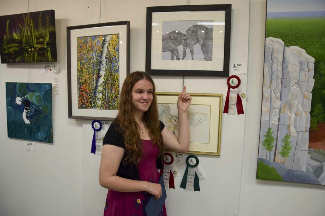 Katelyn Shank took first place and the Patricia L. Meehan Award for ‘Mothers Love’ in the high school student category. photo by Michael Erskine