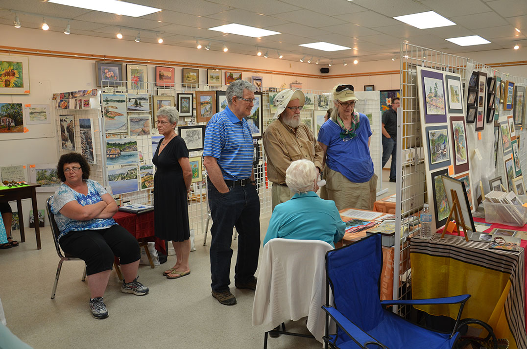 Art lovers and students admired the many works on display at the Whitefish Falls Community Centre as part of the LaCloche Art School’s 30th anniversary alumni exhibition.