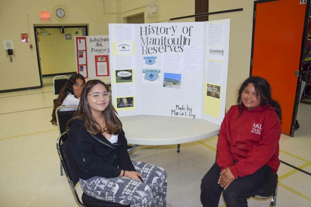 Maria and Lizzy explored the History of Manitoulin Reserves for their Cultural Day project. photo by Michael Erskine