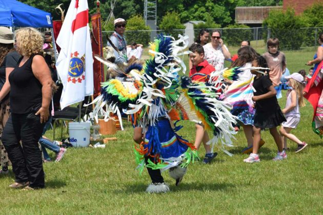 An explosion of colour is exhibited by this fancy dancer in full regalia at Lakeview School. photo by Michael Erskine