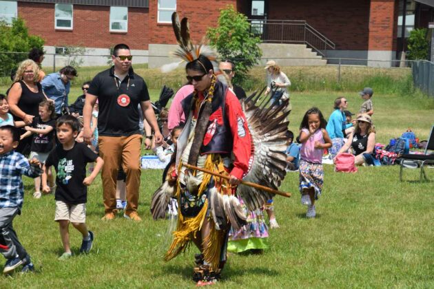 Head male dancer Noah Haner carried himself in Men’s Traditional regalia at the Lakeview School Powwow. photo by Michael Erskine