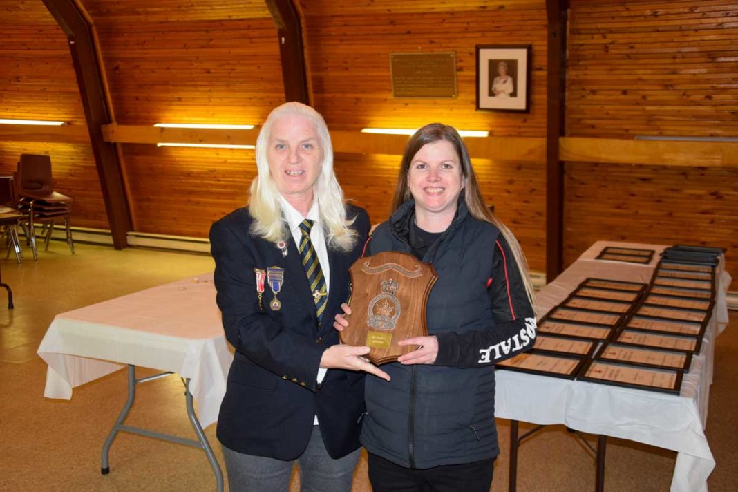 Past President Ruth Eadie presents Kari Bourque with the Legionnaire of the Year Award for 2022.