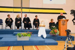 Manitoulin Rainbow District Board Trustee Larry Killens addresses the student body.