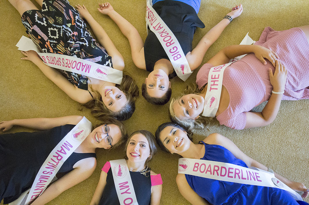 Miss Manitoulin contestants smile big for the camera during rehearsals