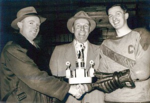 Bill getting the championship trophy for his team.