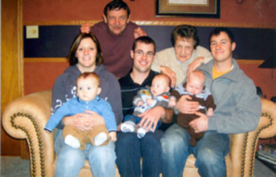 Four generations of the Woods family gather in December 2006.