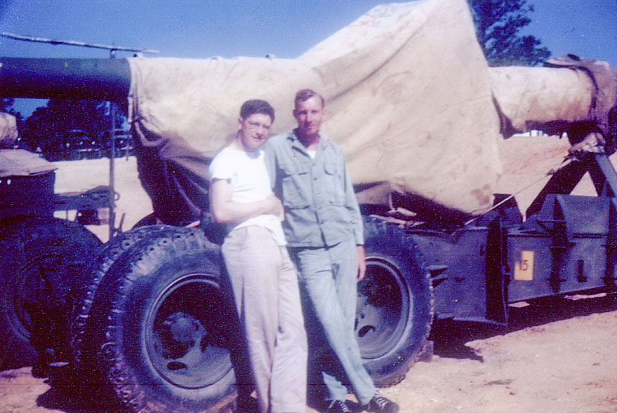 NT May 1944- PFC W. B. Sullivan and PFC George Kent in front of a 'Big Tom'