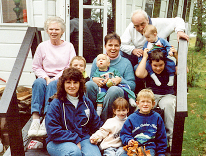 Jean with their daughters and grandchildren at the cottage.