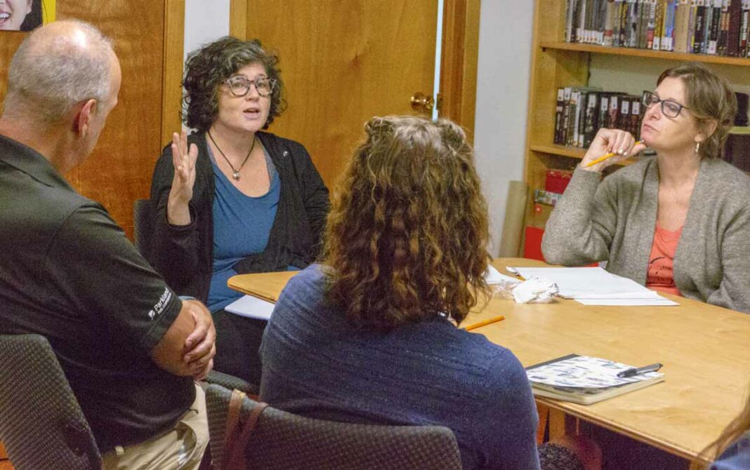 Writer, story editor and producer Claire Ross Dunn (centre) led a writing workshop entitled ‘Mining your Life for Art’ at the Kagawong Library during the NorthWords Festival. photo by Isobel Harry