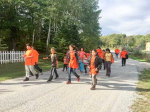 Youth in Sheshegwaning First Nation sport orange in  recognition of the many losses experienced by those who attended residential schools.