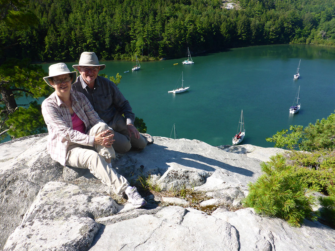 John and Irene Clement sit high above a gathering of trailer sailors in the North Channel.