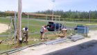 Pearson-cup–Devin-Lockeyer,-Kennedy-Lanktee-and-Michelle-Lankree-digging-holes-for-posts-for-the-new-dugout-on-home-side-of-‘A’-Field