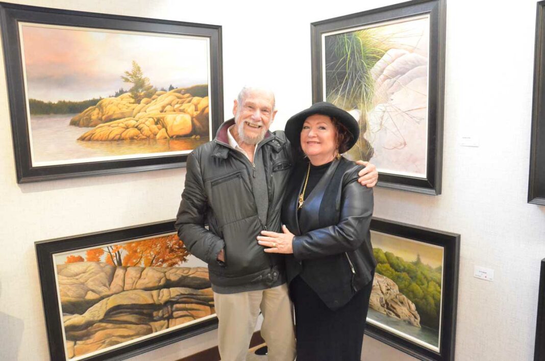 Artist Ivan Wheale and Perivale Gallery owner Shannon McMullan pose during previous opening. This year’s collection features Mr. Wheale’s ‘Dimensions: An Artist’s Vision.’ photo by Michael Erskine