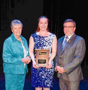 Heather Theijsmeijer of Manitoulin Secondary School is presented with an Award for Excellence from RDSB Chair Doreen Dewar and Director of Education Norm Blaseg.