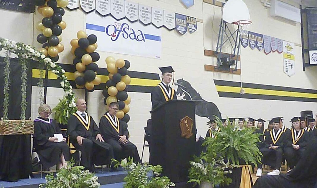 Rhys Allison delivering his valedictorian speech. photo by Alexandra Wilson-Zegil