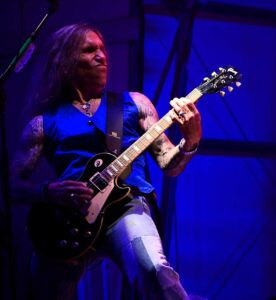 Aldo Nova guitarist Jack Frost wows the crowd with a riff. photo by Gary Desabrais