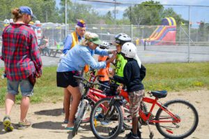 A few last minute adjustments before the bike races begin.