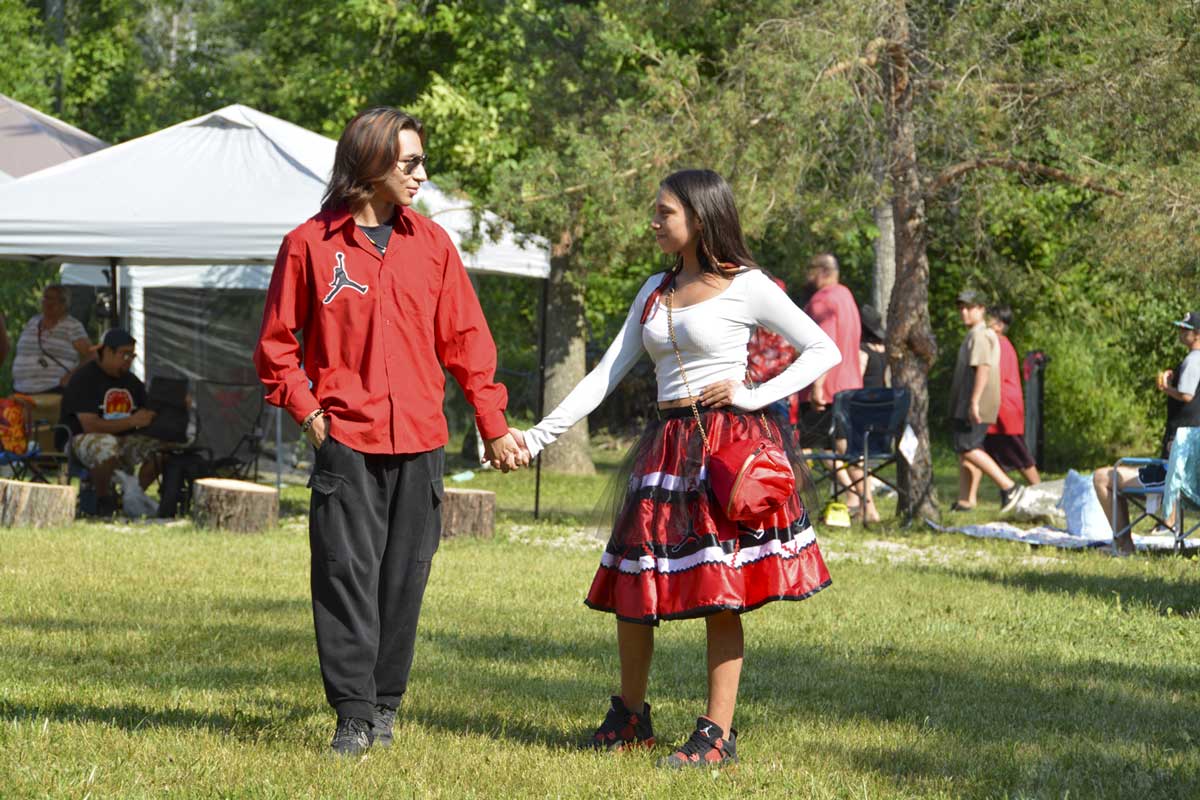 One of the highlights of this year’s jiingtamok was a fashion show featuring designs by Cheyanne Manitowabi. The couple above is modeling designs inspired by Air Jordan. photo by Alicia McCutcheon