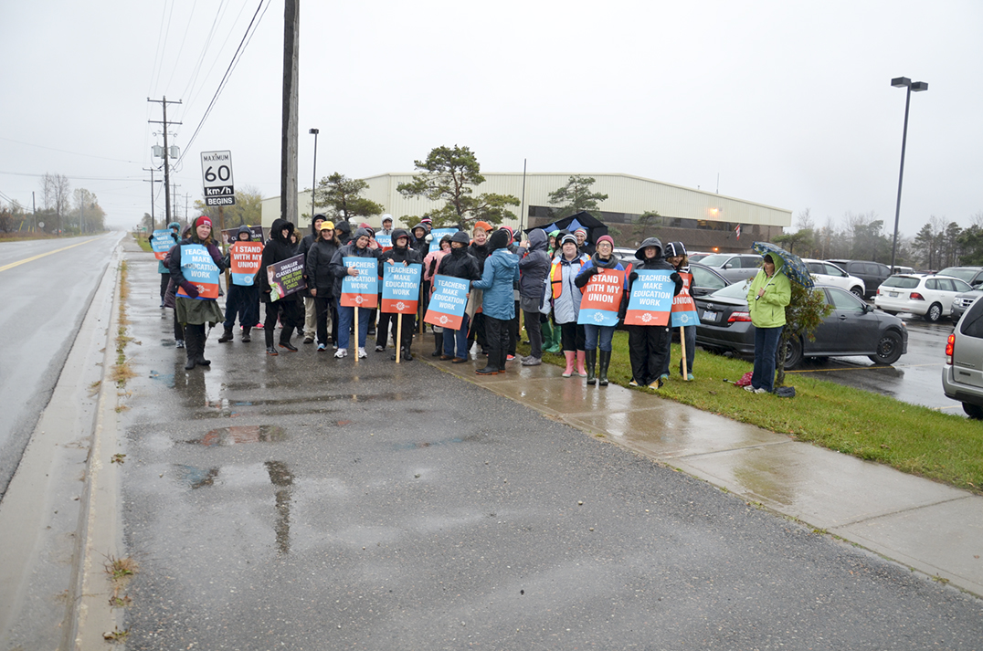 Elementary school teachers from across Manitoulin braved the wind and rain last Wednesday afternoon to demonstrate along Highway 6 following the premier’s November 1 ultimatum.