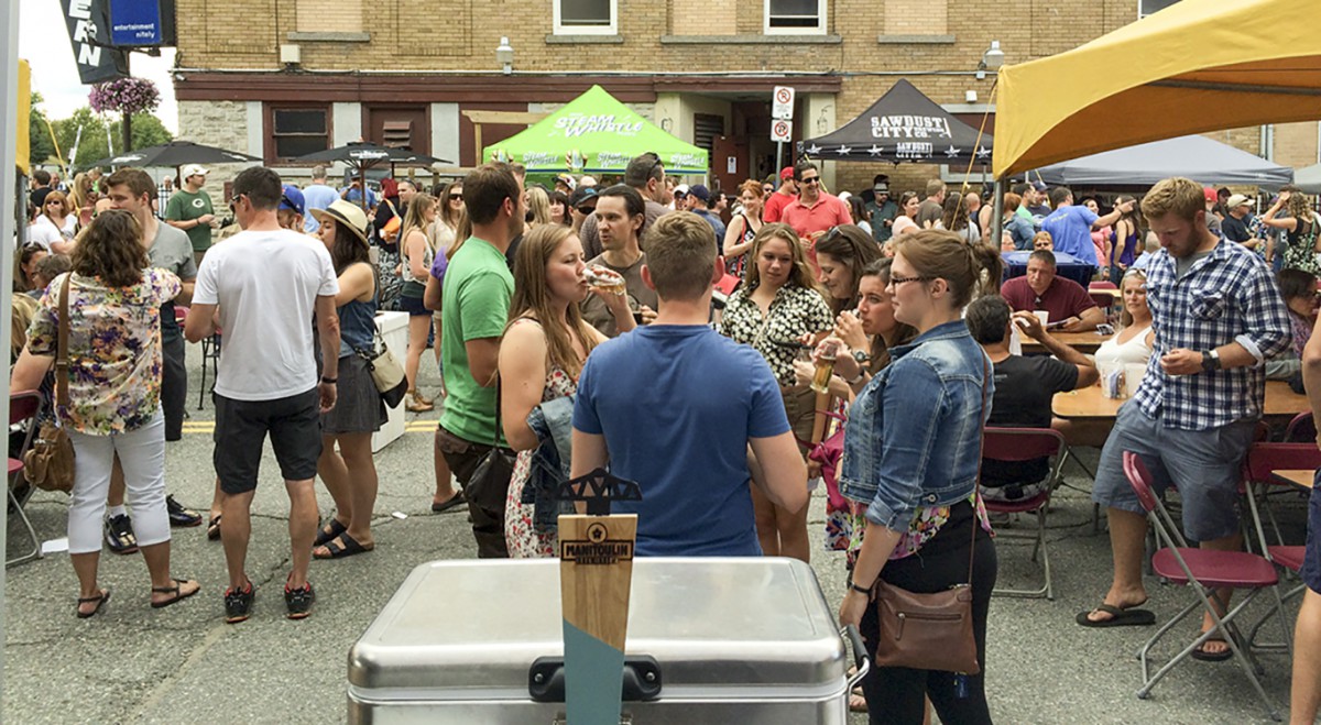 The crowd before the Manitoulin Brewing Co. tent was full at the Elgin Street Craft Beer Festival.