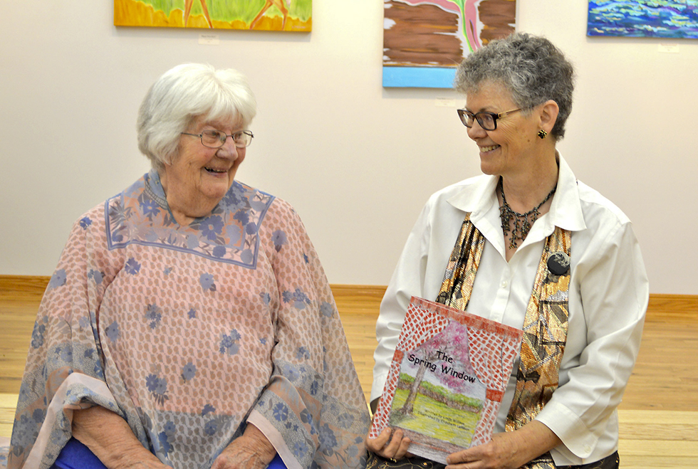 Author Linda Willson, right, and illustrator Elizabeth Lehman at the launch of Willson’s second book of poems of the four seasons, ‘The Spring Window,’ at the Gore Bay Museum in June. photo by Jan McQuay