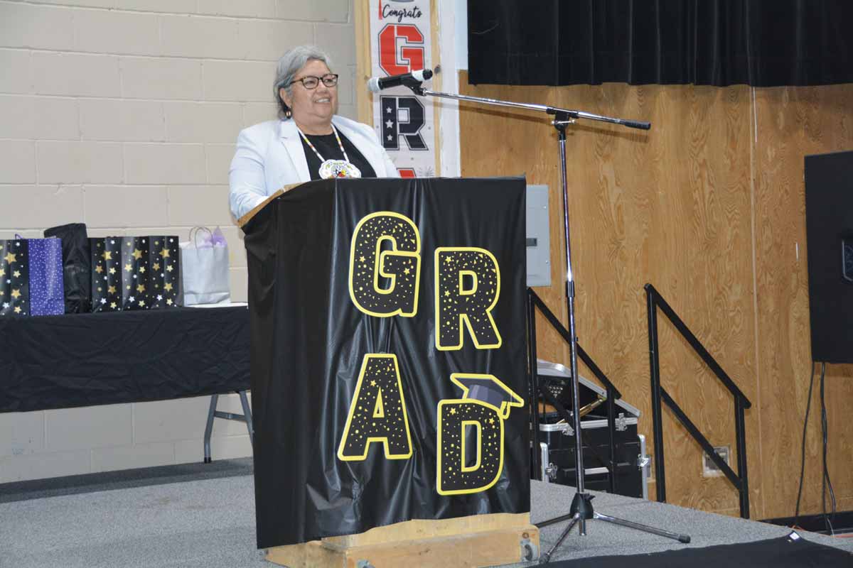 Wiikwemkoong Ogimaa Rachel Manitowabi addressing the graduates.