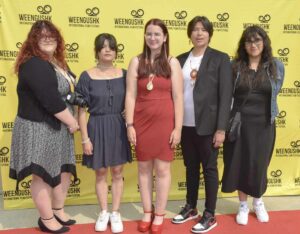 The red carpet was a popular spot on the way into the festival. photo by Michael Erskine