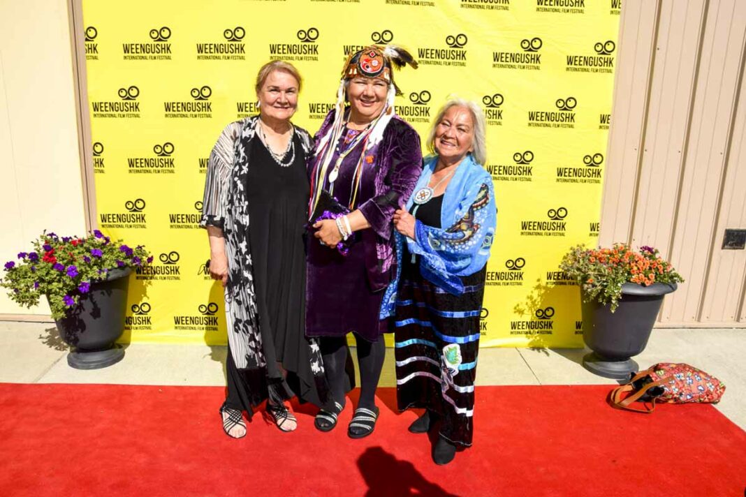 Former National Chief RoseAnne Archibald on the red carpet of last year’s Weengushk International Film Festival (WIFF), centre, flanked by, left, Dr. Shirley Cheechoo, WIFF founder, and Order of Canada recipient Jeanette Corbiere Lavell.