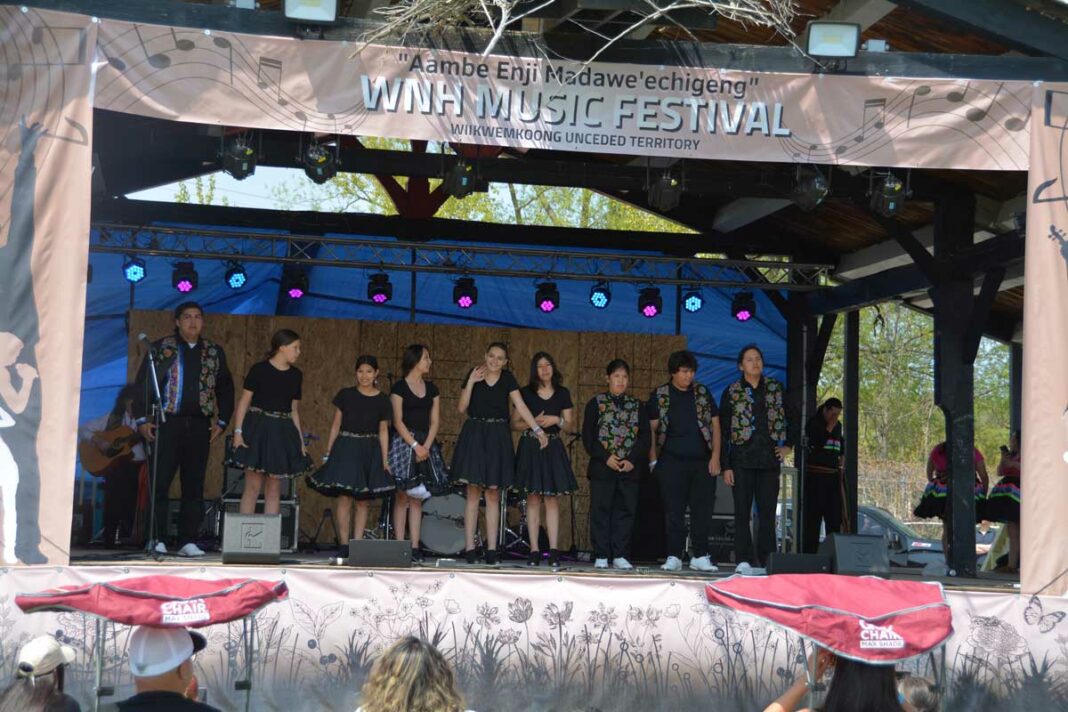 With just a few days of lessons under their belts, the Wiikwemkoong High School’s own ‘Ojibwe Tappers’ performed the Red River Jig for an adoring audience at the Wiikwemkoong Nursing Home Music Festival Sunday afternoon. photos by Alicia McCutcheon